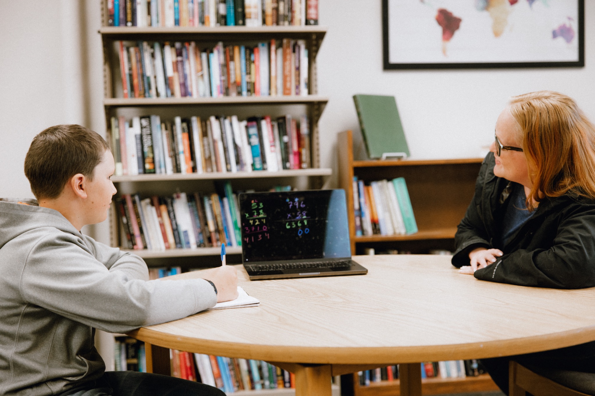 An Alaska Bible College elementary education professor teaching a student