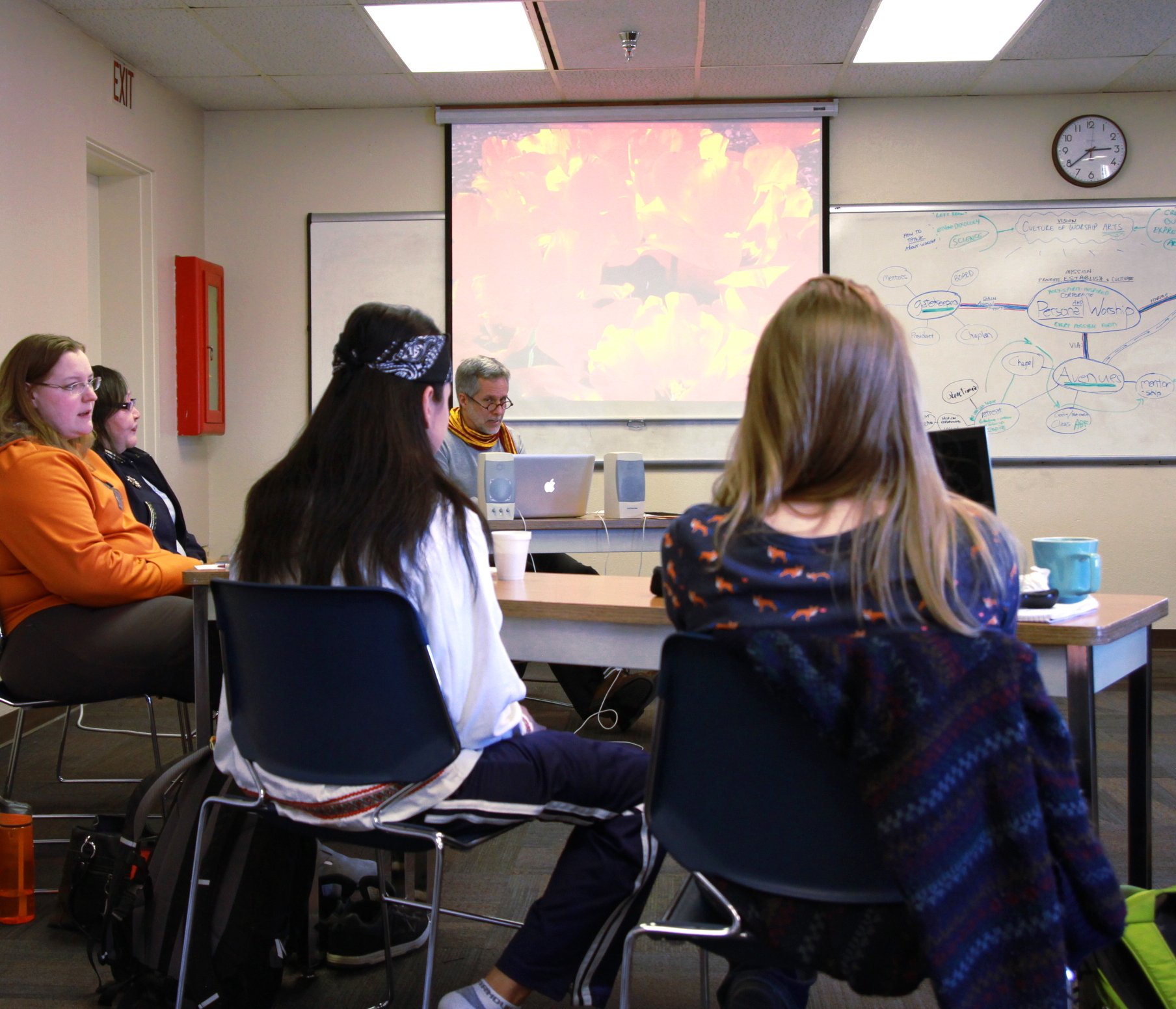 Alaska Bible College students engaged in advanced classroom study
