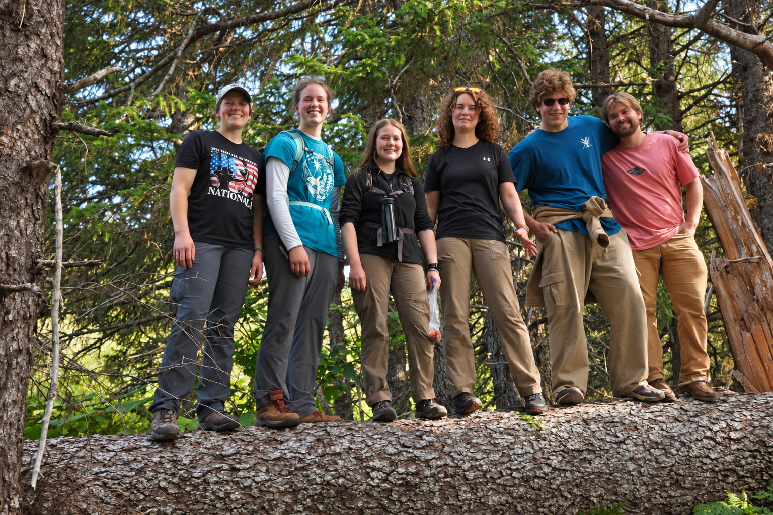 ABC students standing together on a forest hike in Seldovia